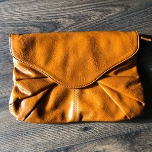 Patent leather cognac brown clutch